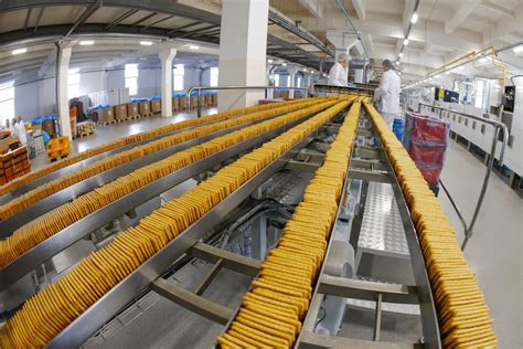 Nuotrauka, vaizduojanti modernią spaudos įrangą UAB Daigai gamykloje.