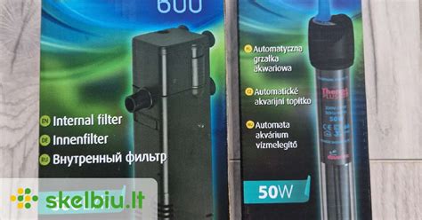 Akvariumo filtras ir šildytuvas sumontuoti prie galinės sienelės.