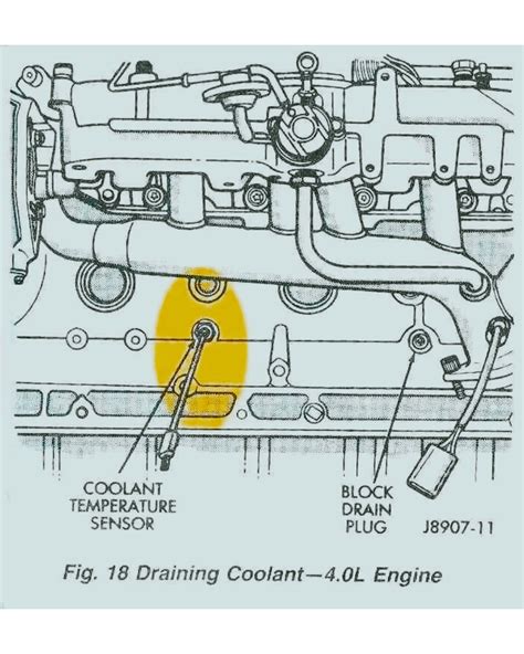 schema showing the oil drain plug location on a tractor engine