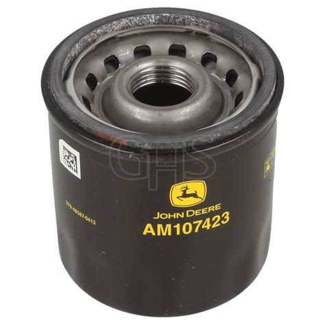 image of a tractor engine with the oil filter highlighted